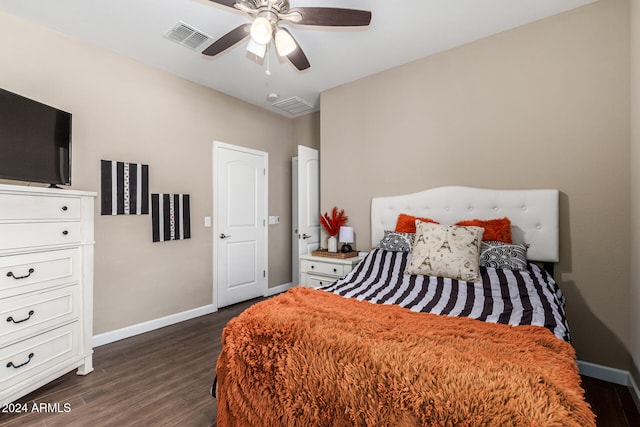 bedroom featuring ceiling fan and dark hardwood / wood-style flooring