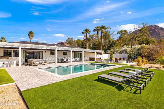 outdoor pool featuring outdoor dry bar, a pergola, an outdoor living space, fence, and a lawn