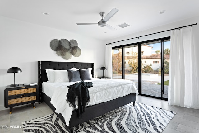 bedroom featuring access to exterior, ceiling fan, and light tile patterned floors