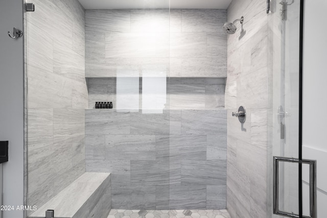 bathroom with a shower stall