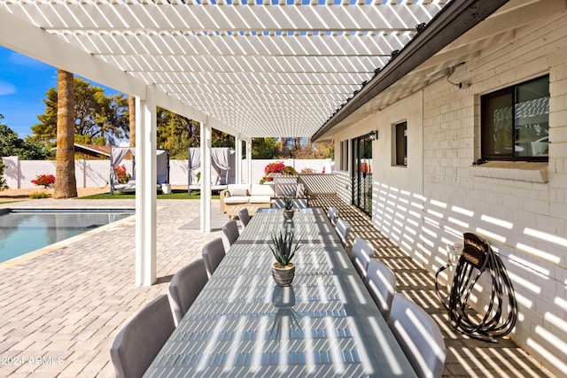 view of patio / terrace with a fenced backyard, a fenced in pool, an outdoor hangout area, and a pergola