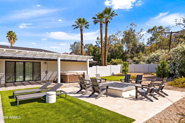 view of patio / terrace featuring an outdoor fire pit, a hot tub, and a pergola