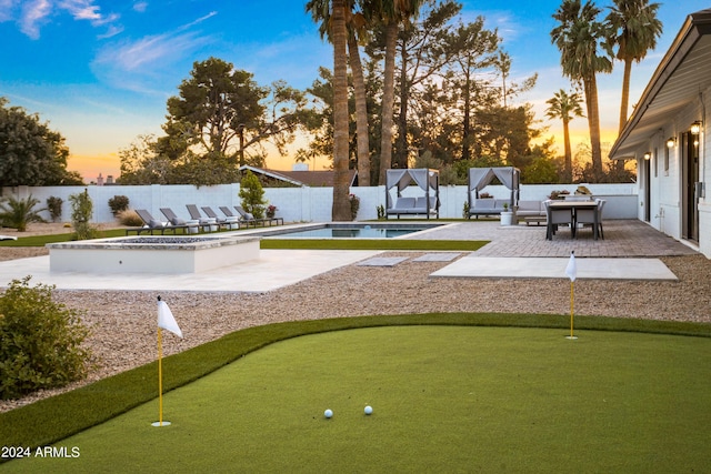 view of property's community featuring a fenced backyard, a patio, and a pool