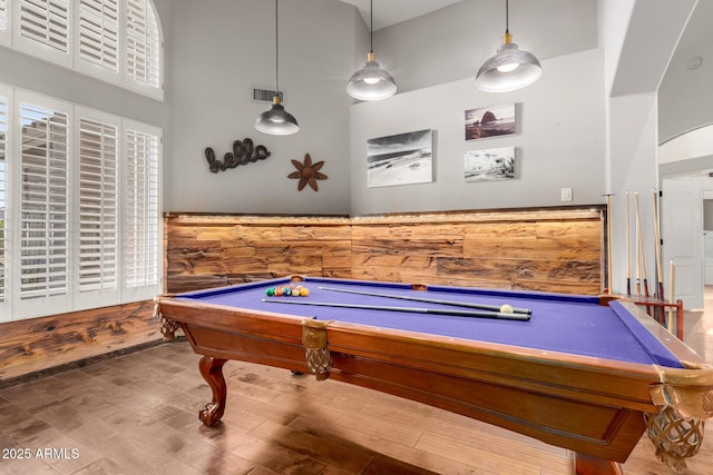 2058 E Marlene Dr, Gilbert, AZ 85296 - recreation room with billiards, wood finished floors, a high ceiling, and a wainscoted wall