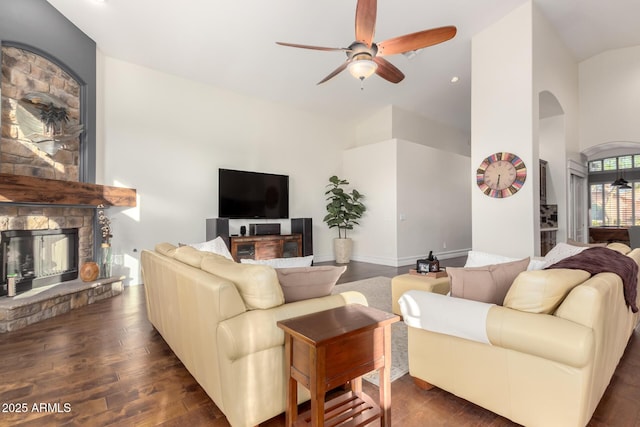 2058 E Marlene Dr, Gilbert, AZ 85296 - living room featuring ceiling fan, arched walkways, a fireplace, high vaulted ceiling, and recessed lighting