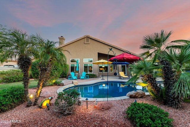 2058 E Marlene Dr, Gilbert, AZ 85296 - pool at dusk with a patio area and an outdoor pool