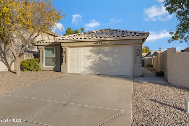 view of front of home with a garage