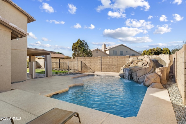 view of pool featuring a patio area, a fenced backyard, and a fenced in pool