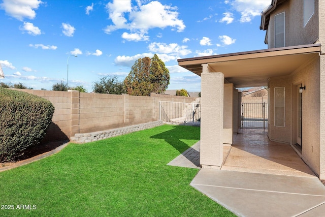 view of yard featuring a fenced backyard and a patio