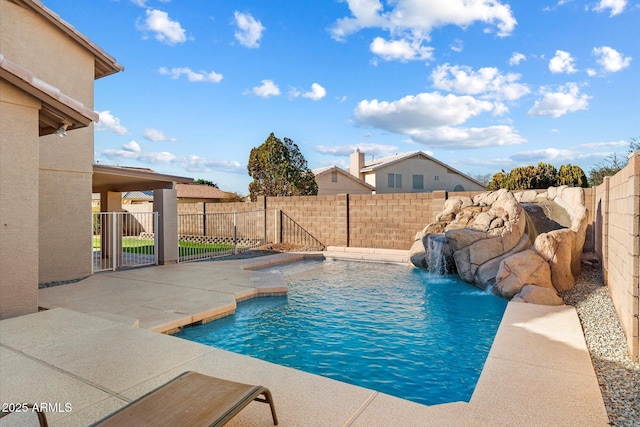 view of swimming pool with a fenced in pool, a fenced backyard, and a patio