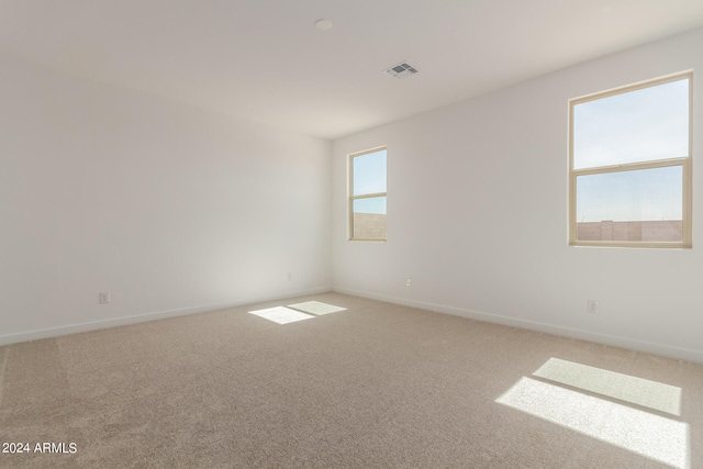 unfurnished room with carpet floors