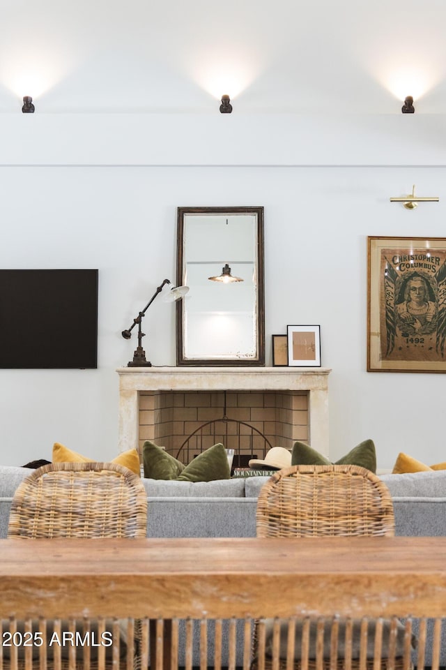 living room featuring a fireplace