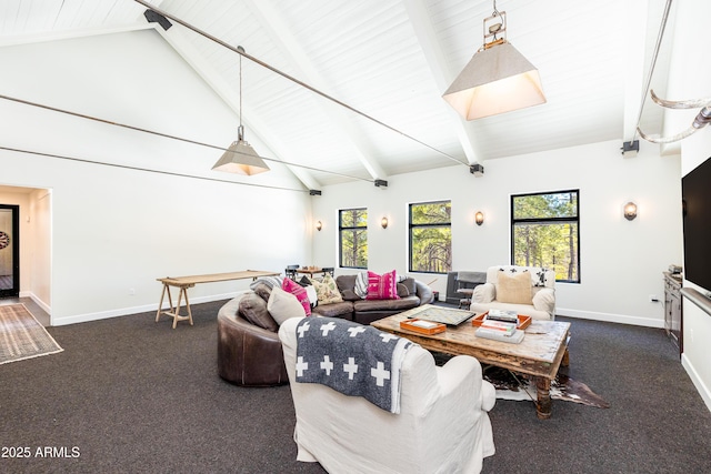 living room with high vaulted ceiling, beam ceiling, plenty of natural light, and dark carpet