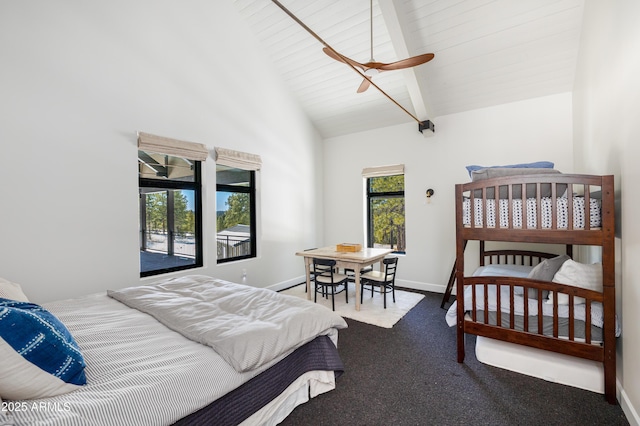 carpeted bedroom featuring beamed ceiling, baseboards, and high vaulted ceiling