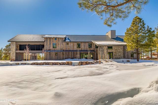 view of snow covered property