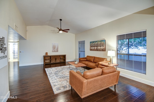 living room with dark hardwood / wood-style flooring, ceiling fan, and lofted ceiling