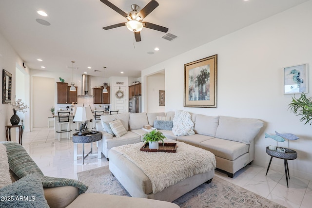 living room featuring ceiling fan