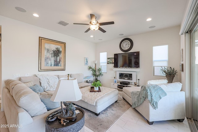 living room featuring ceiling fan