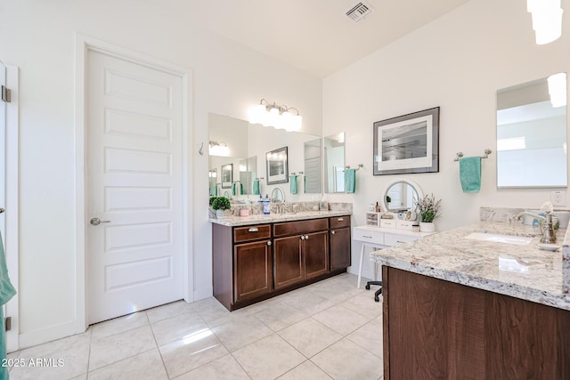 bathroom featuring vanity and tile patterned floors