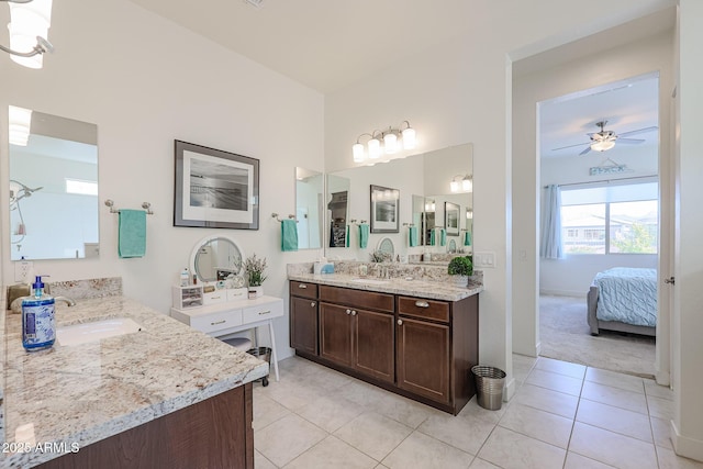 bathroom featuring vanity, tile patterned floors, and ceiling fan