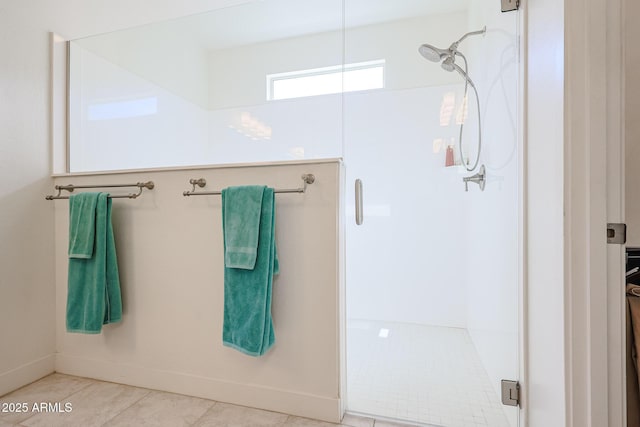 bathroom featuring a shower with shower door