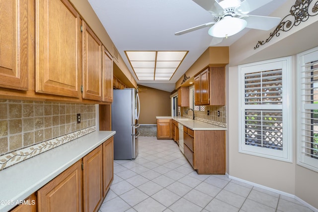 13721 W Franciscan Dr, Sun City West, AZ 85375 - kitchen featuring freestanding refrigerator, a sink, white dishwasher, and light countertops