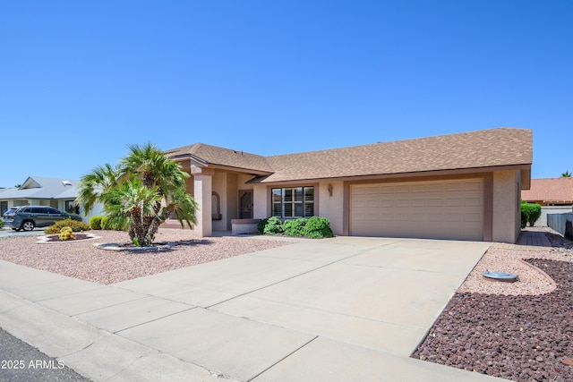 13721 W Franciscan Dr, Sun City West, AZ 85375 - single story home featuring stucco siding, a garage, and driveway