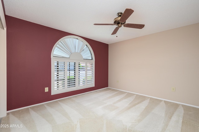 13721 W Franciscan Dr, Sun City West, AZ 85375 - carpeted spare room with a ceiling fan and baseboards
