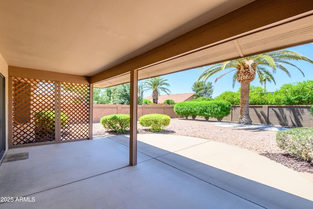 13721 W Franciscan Dr, Sun City West, AZ 85375 - fenced backyard featuring a patio area