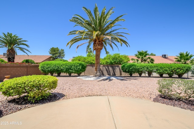 13721 W Franciscan Dr, Sun City West, AZ 85375 - fenced backyard with a patio and cooling unit
