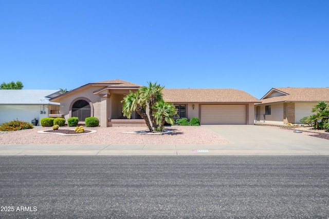 13721 W Franciscan Dr, Sun City West, AZ 85375 - ranch-style home with an attached garage, concrete driveway, and stucco siding