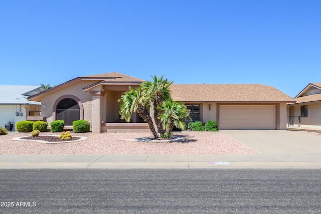 13721 W Franciscan Dr, Sun City West, AZ 85375 - ranch-style home with a garage, stucco siding, and driveway