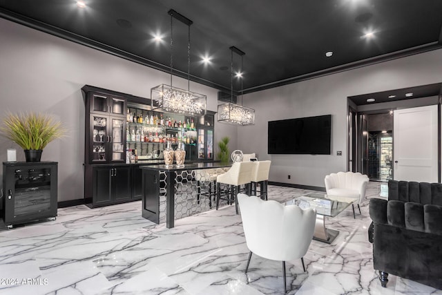 bar with decorative light fixtures and crown molding