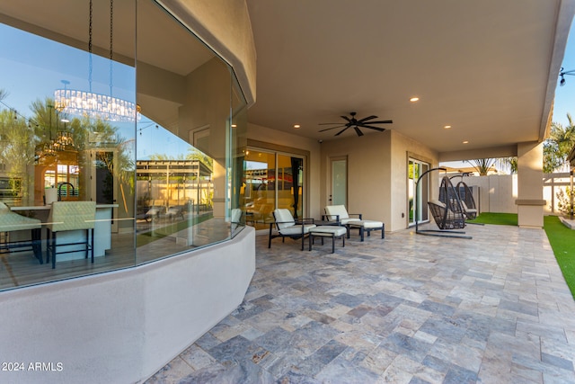 view of patio / terrace featuring ceiling fan and an outdoor hangout area