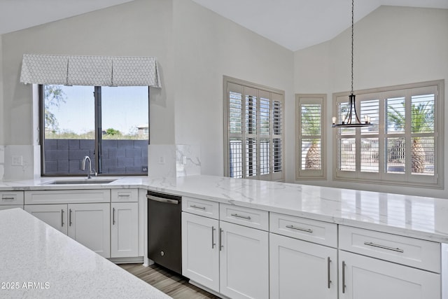 11257 E Reginald Ave, Mesa, AZ 85212 - kitchen featuring dishwasher, white cabinetry, a chandelier, wood finished floors, and high vaulted ceiling