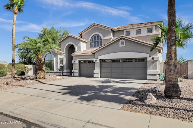 11257 E Reginald Ave, Mesa, AZ 85212 - mediterranean / spanish home with an attached garage, stucco siding, driveway, and a tiled roof
