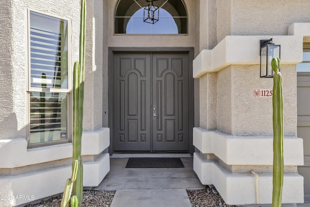 11257 E Reginald Ave, Mesa, AZ 85212 - doorway to property featuring stucco siding