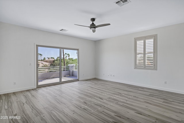 11257 E Reginald Ave, Mesa, AZ 85212 - spare room featuring a ceiling fan and wood finished floors