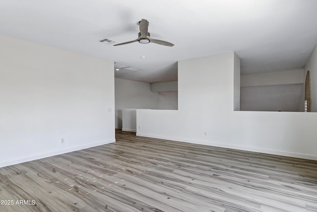 11257 E Reginald Ave, Mesa, AZ 85212 - empty room with ceiling fan and wood finished floors