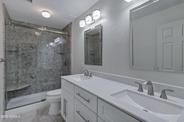 11257 E Reginald Ave, Mesa, AZ 85212 - bathroom with a shower stall, double vanity, and marble look tile flooring