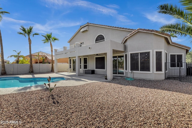 11257 E Reginald Ave, Mesa, AZ 85212 - rear view of house with stucco siding, a fenced backyard, a patio area, and a ceiling fan