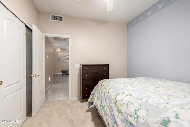 1950 E Kings Ave, Phoenix, AZ 85022 - bedroom with light carpet, light tile patterned floors, baseboards, and a closet