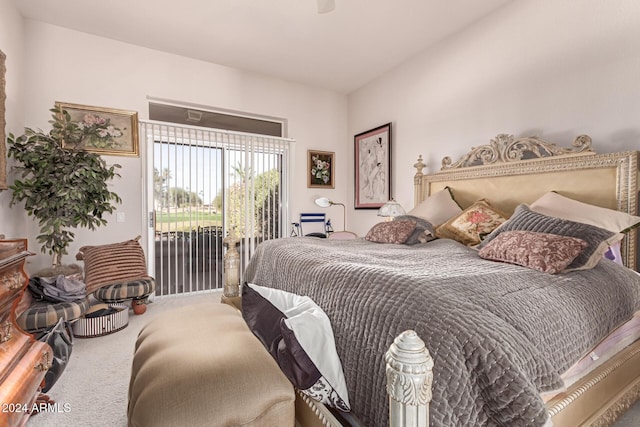 bedroom with carpet flooring and access to outside