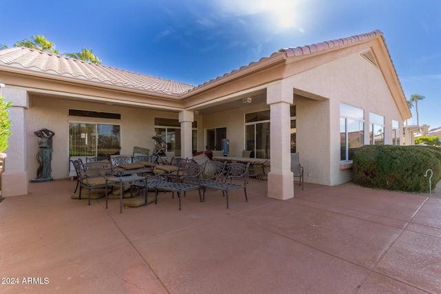 back of house featuring a patio area