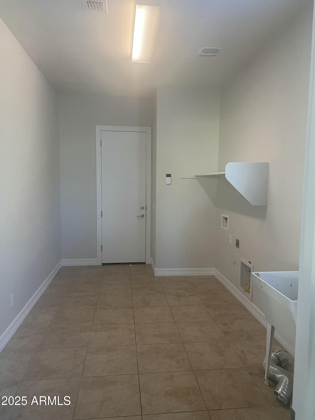 laundry area featuring hookup for an electric dryer, washer hookup, and tile patterned floors