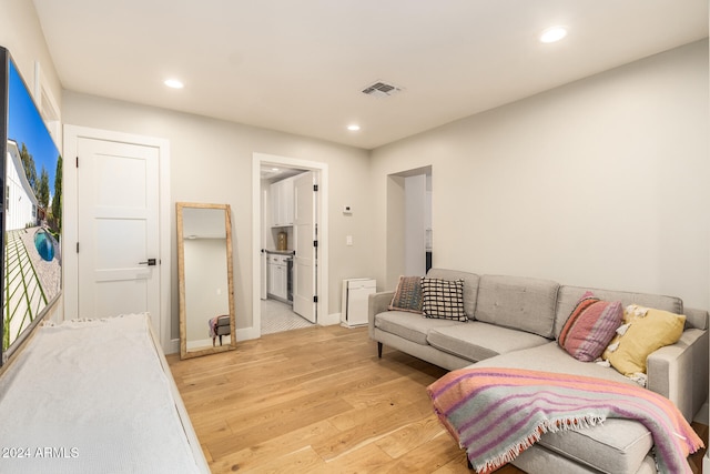 living room with light hardwood / wood-style flooring