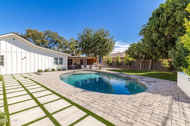 view of pool featuring a patio area