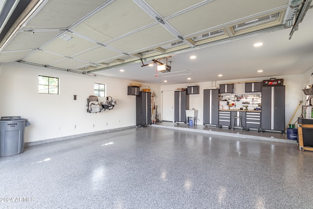 garage featuring a garage door opener