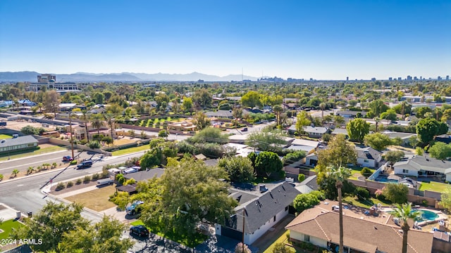 drone / aerial view featuring a mountain view