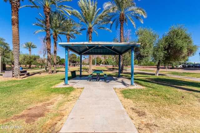 view of home's community with a gazebo and a yard